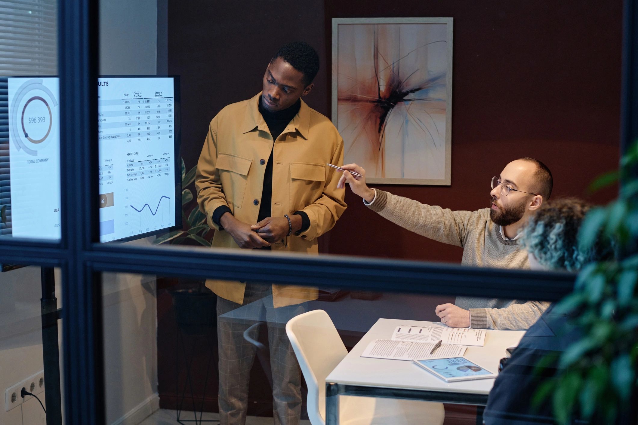 Team collaborating in a modern meeting environment