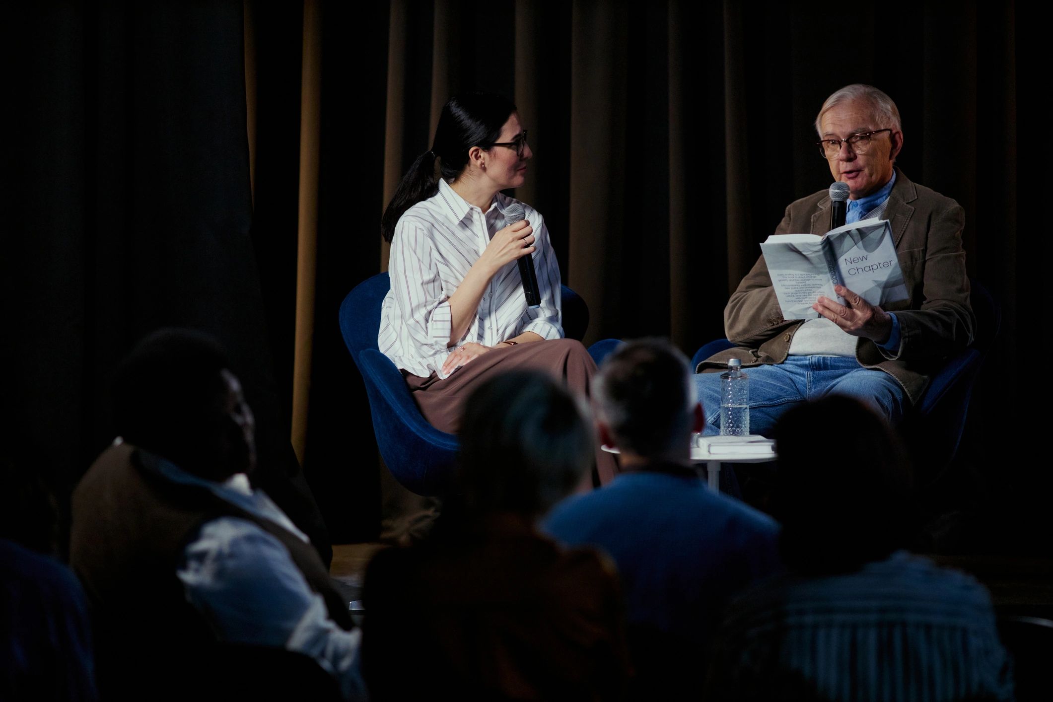 Audience attending a live speaking event