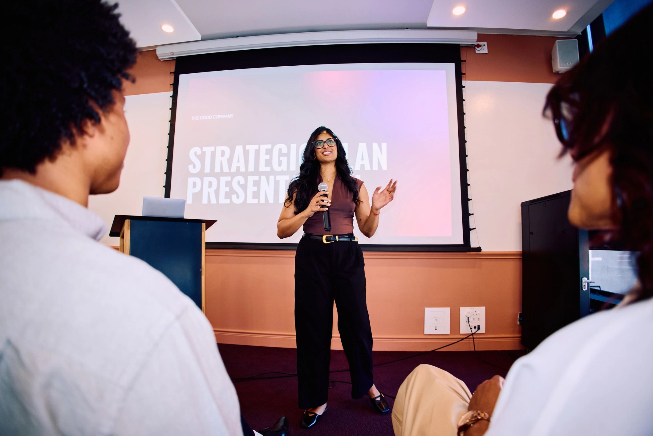 Professional speaker presenting to a live audience